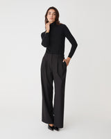 Clarisse Turtleneck Sweater in black — full-length view
