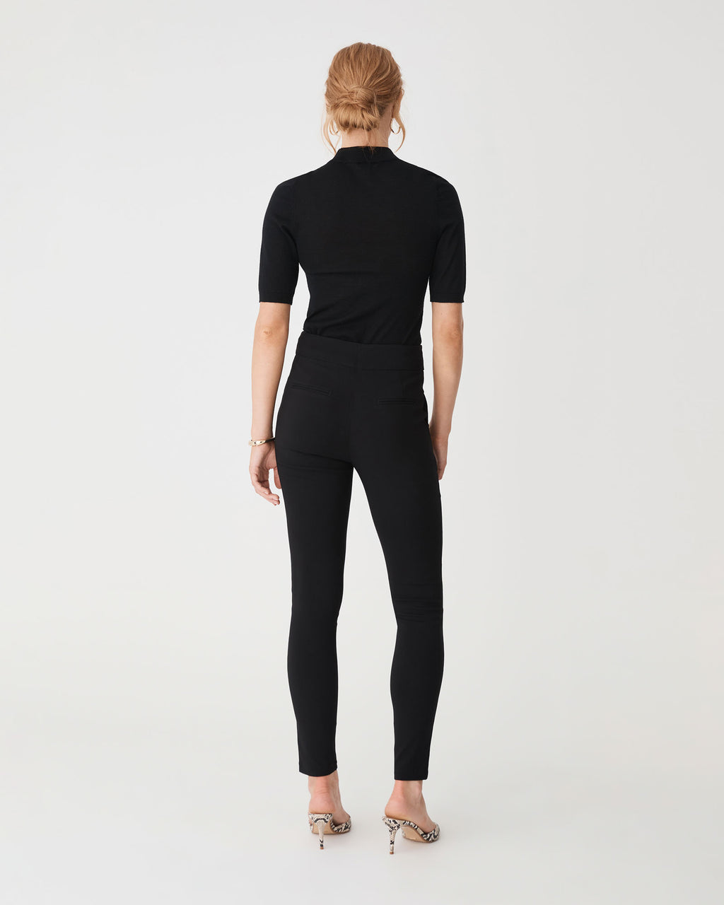 Emily High-Waisted Skinny Pants in black — back view