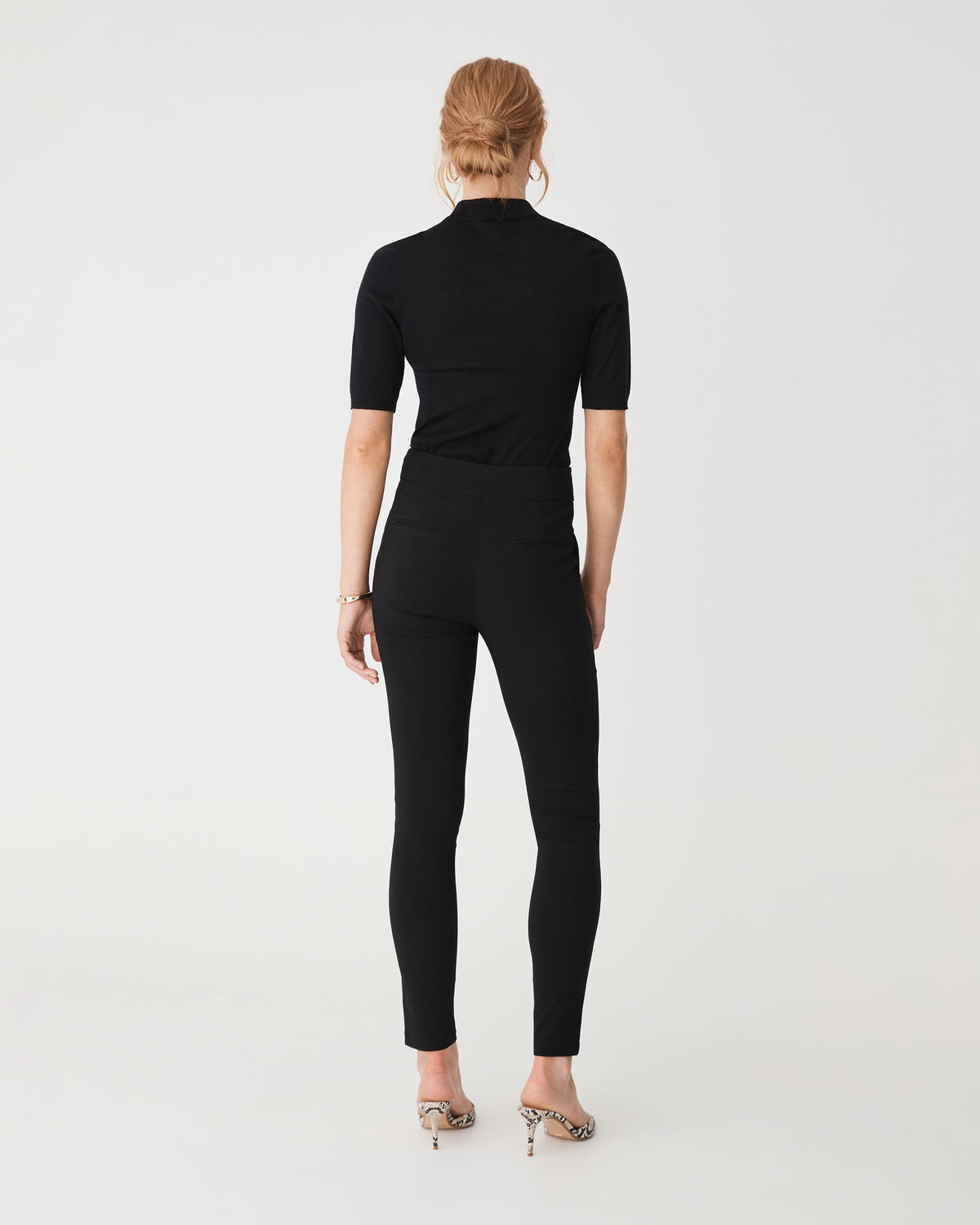 Emily High-Waisted Skinny Pants in black — back view