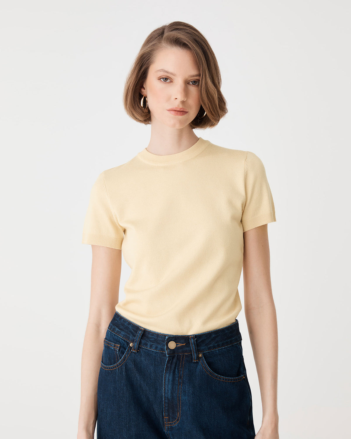 Catherine Short Sleeve Knit in straw yellow — close-up view