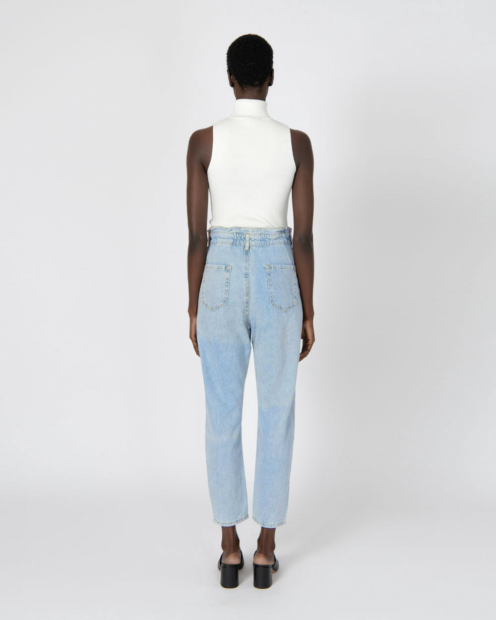 Aubri High-Waisted Jeans in light wash — back view