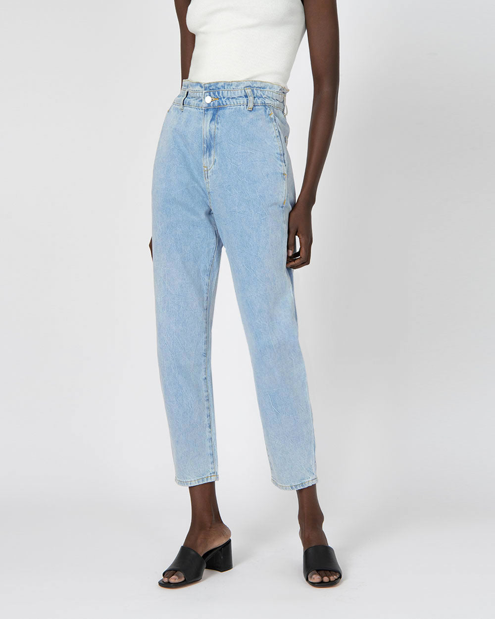 Aubri High-Waisted Jeans in light wash — close-up view 2