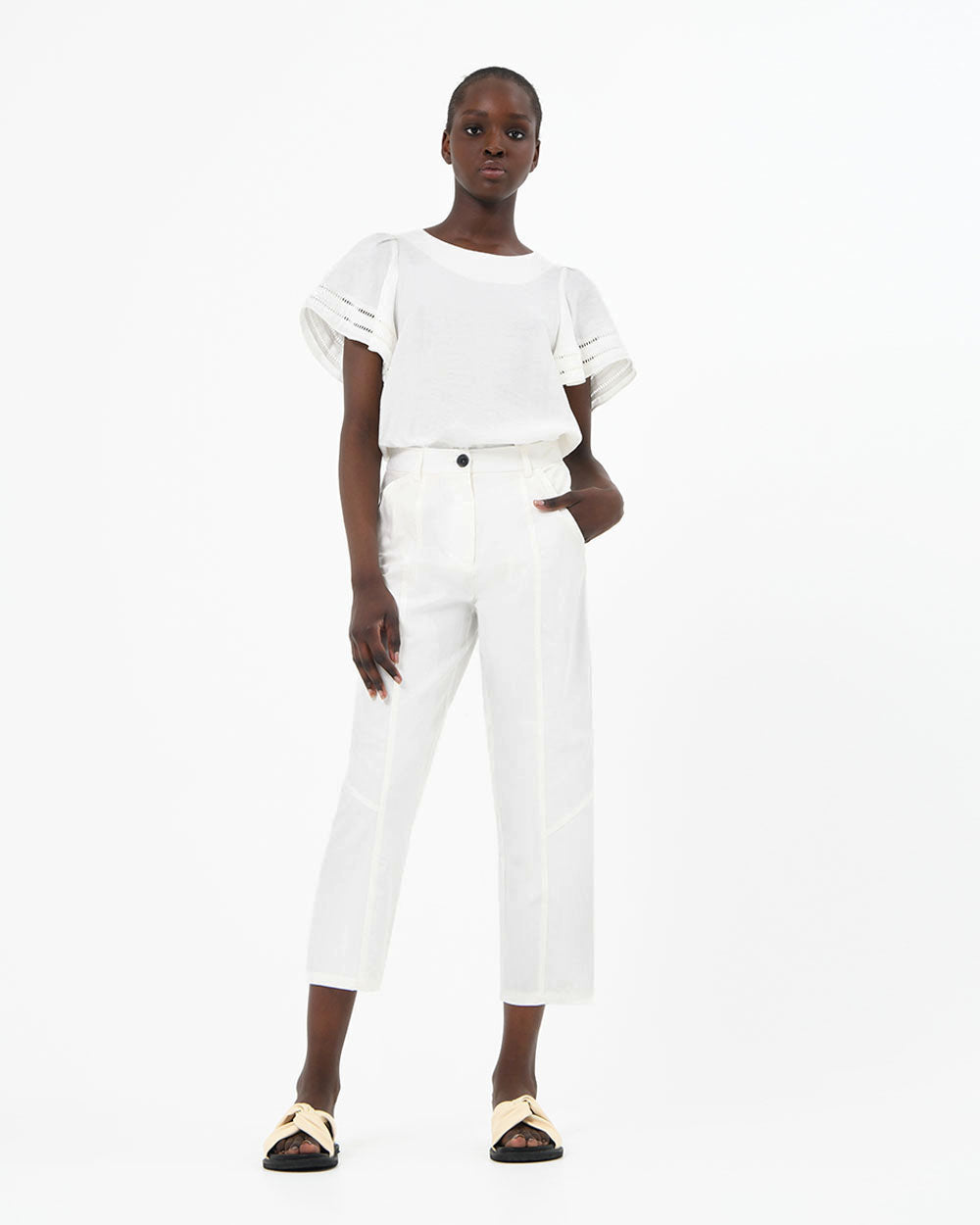 Jeanette Tapered Trousers in ivory — full-length view
