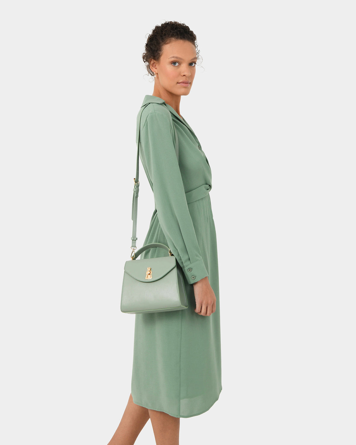 Elaine Twisted Tie Front Dress in green — side view
