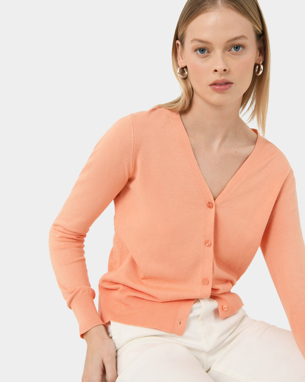 Nicolette V-Neck Knit Cardigan in coral cream — close-up view