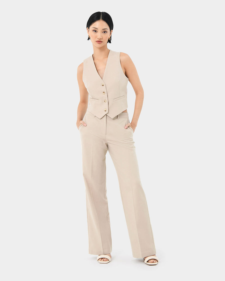 Mariel Wide Trousers in sand beige — full-length view