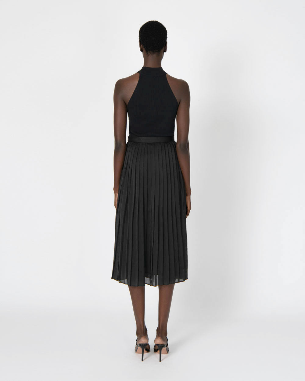 Rosy Pleated Skirt in black — back view