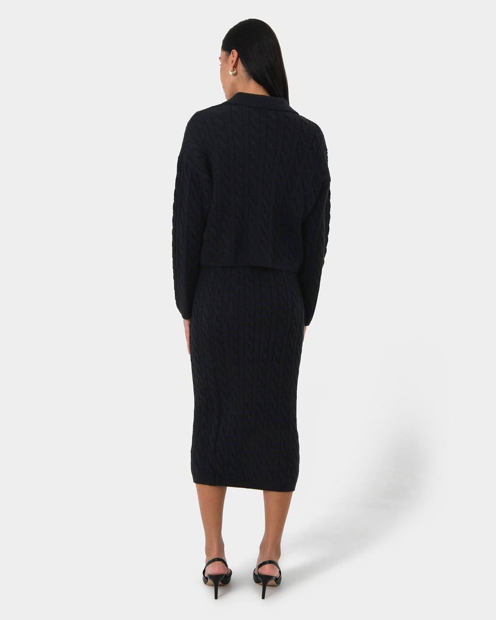 Honesty Cable Midi Knit Skirt in black — back view