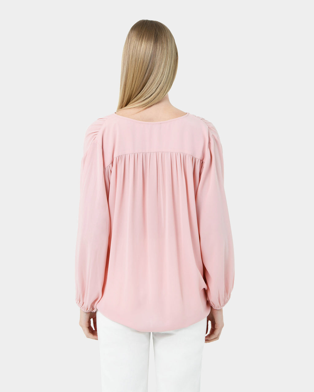 Ikaria Tie Neck Blouse in pastel pink — back view
