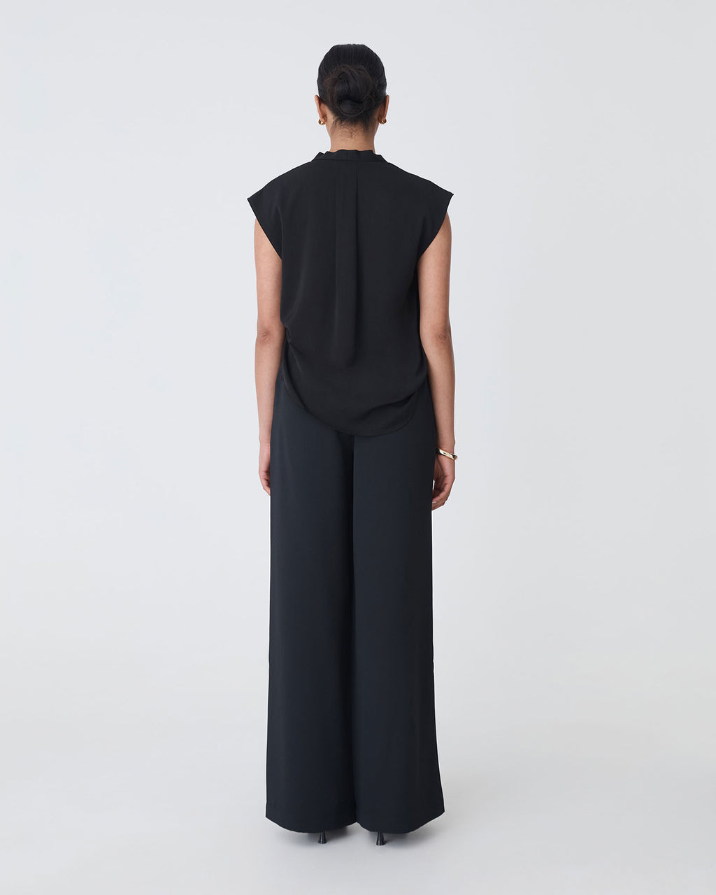 Adelaide V-Neck Cap Sleeve Top in black — back view