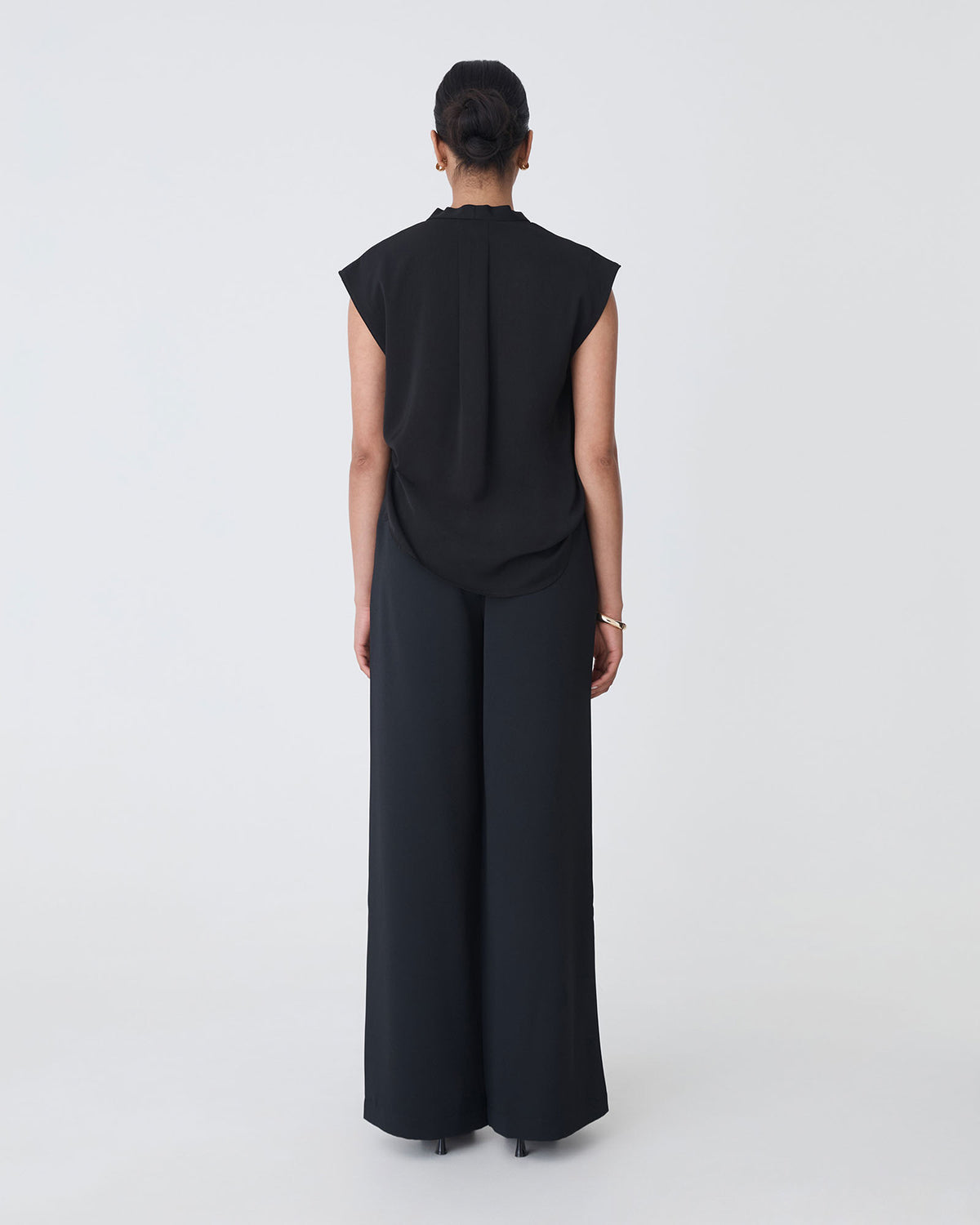 Adelaide V-Neck Cap Sleeve Top in black — back view