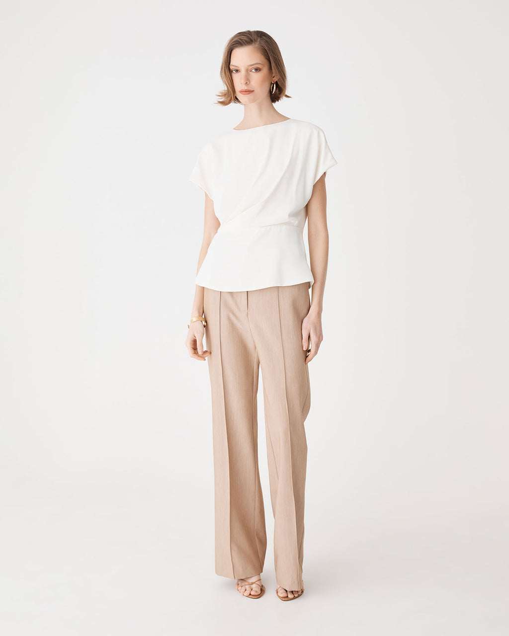 Bonnie Gathered Peplum Top in ivory — full-length view