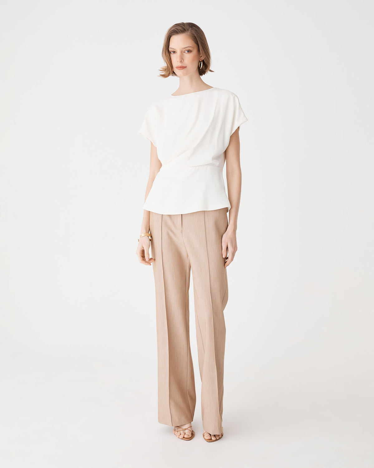 Bonnie Gathered Peplum Top in ivory — full-length view
