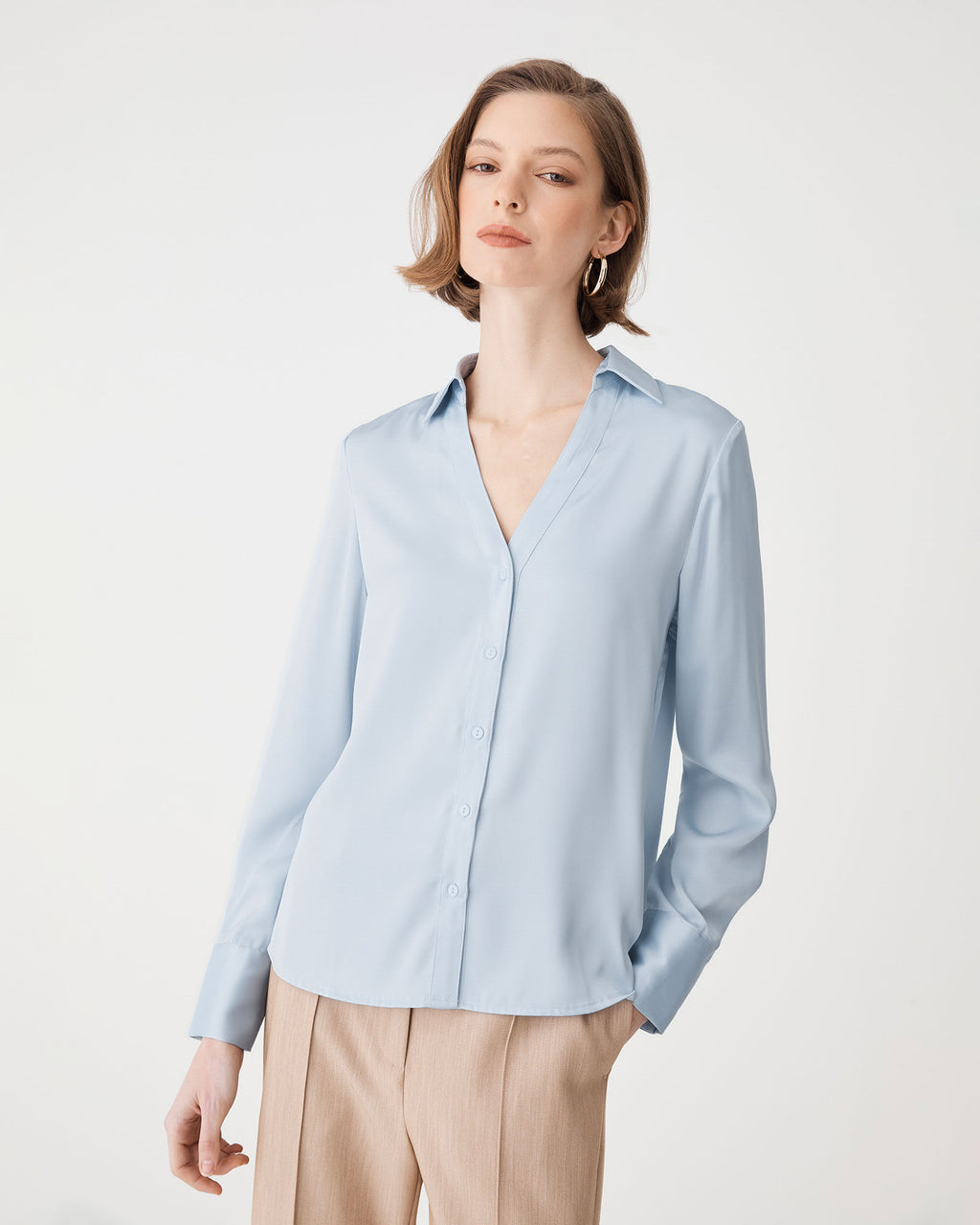 Lila V-Neck Satin Blouse in powder blue — fabric detail