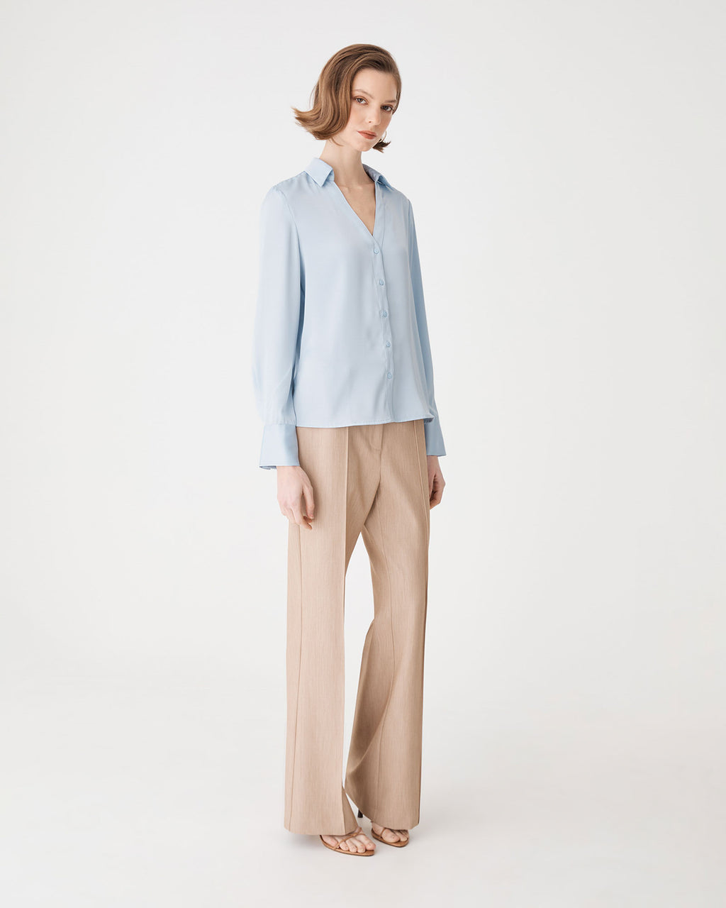 Lila V-Neck Satin Blouse in powder blue — side view