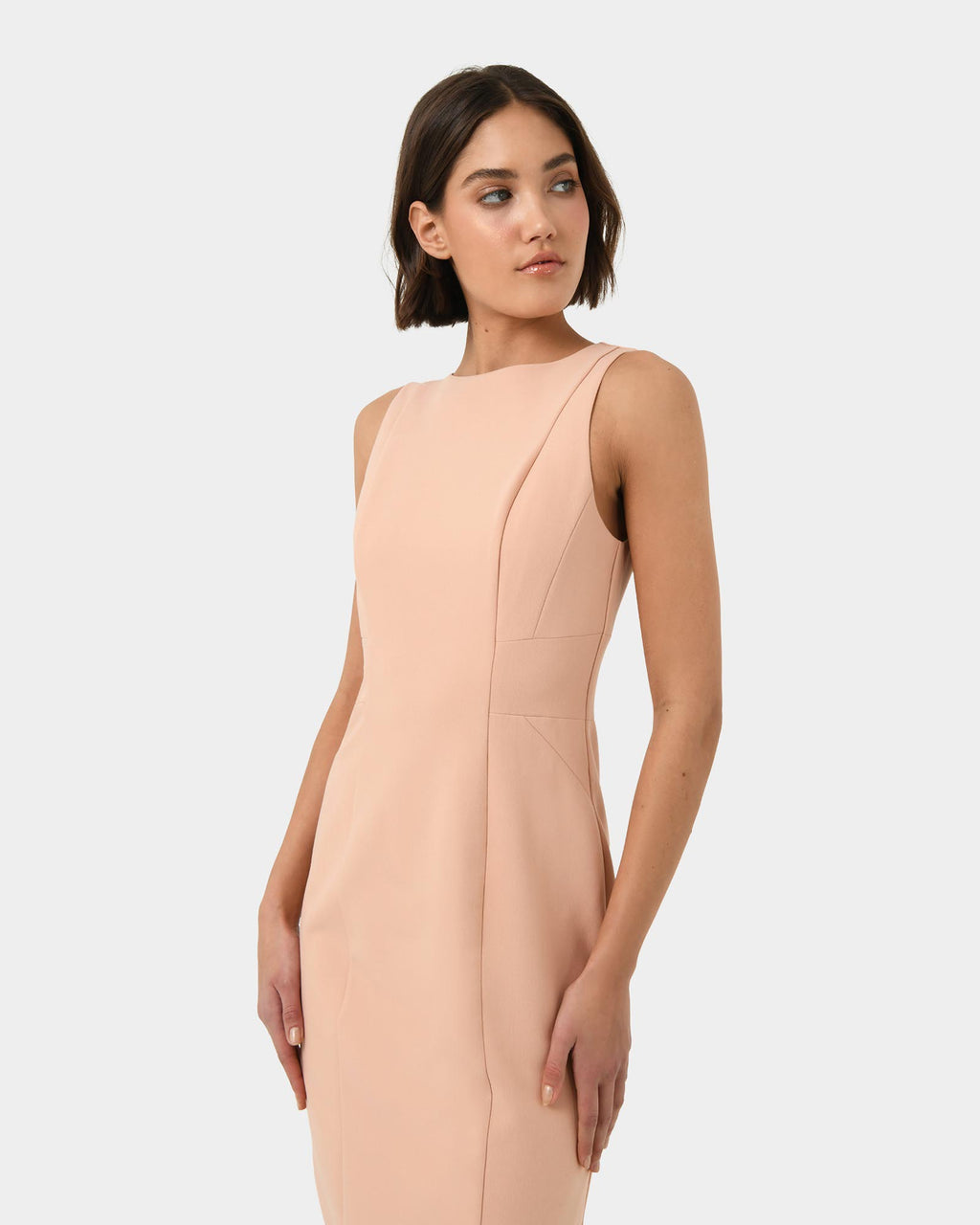 Luna Sleeveless Dress in pastel peach — side view