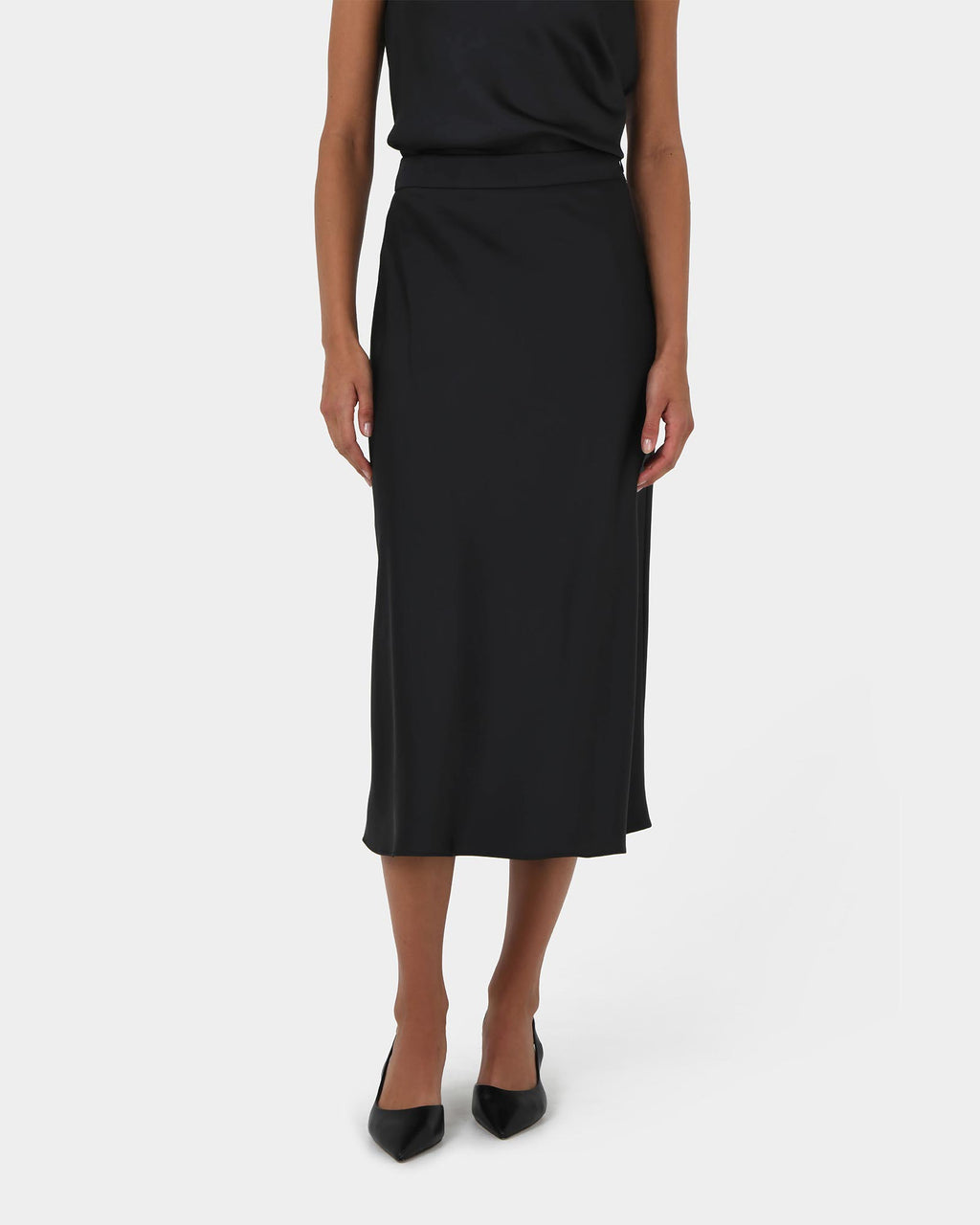 Joy Satin Midi Skirt in black — close-up view
