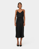 Joy Satin Midi Skirt in black — full-length view