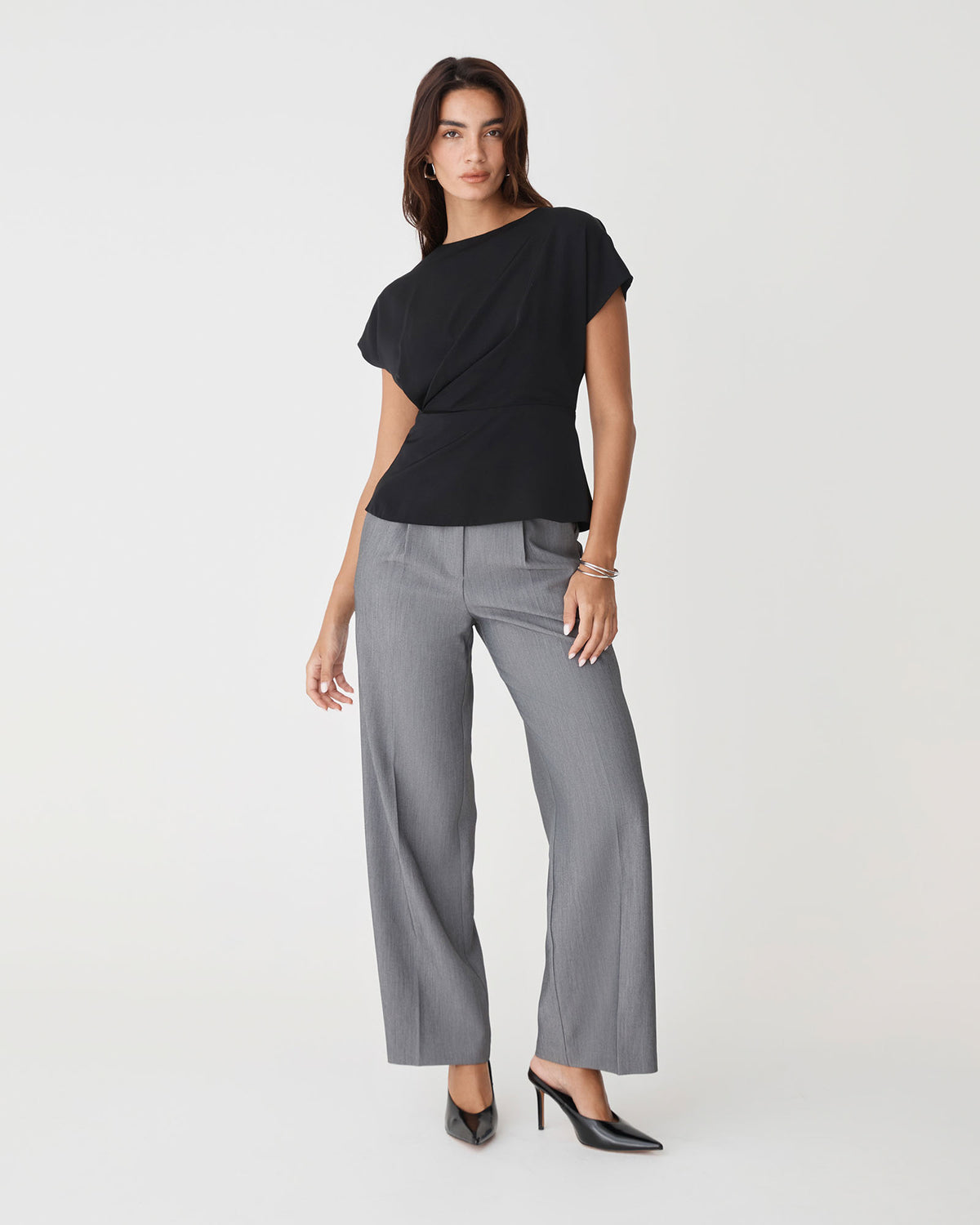 Bonnie Gathered Peplum Top in black — full-length view 2