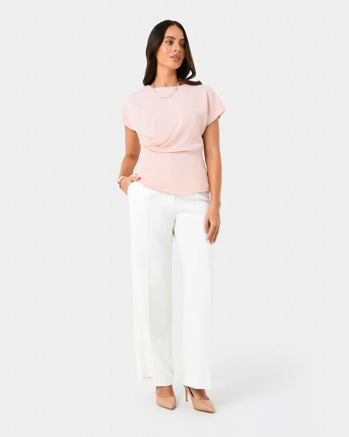 Bonnie Gathered Peplum Top in pastel pink — full-length view