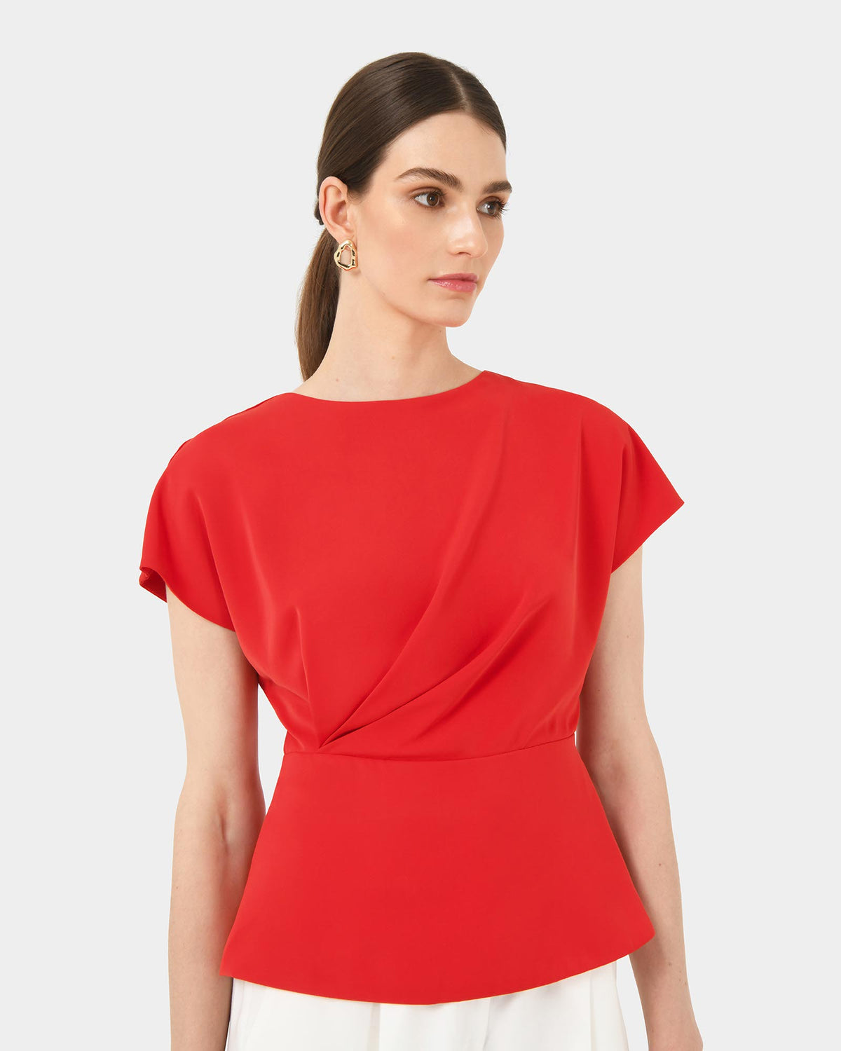 Bonnie Gathered Peplum Top in red — close-up view