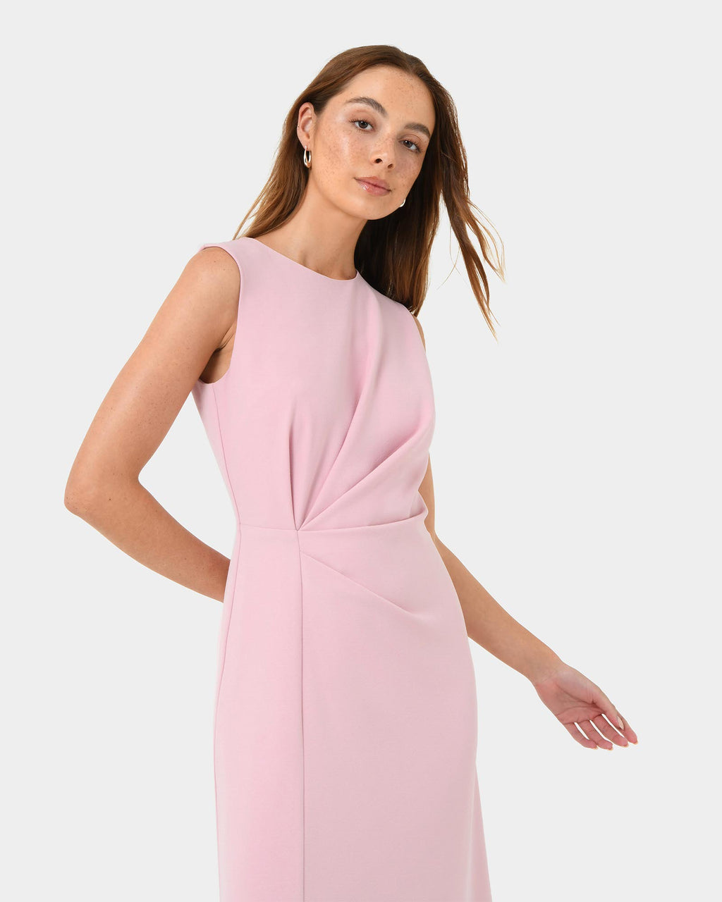 Demi Ruched Midi Dress in pastel pink — close-up view