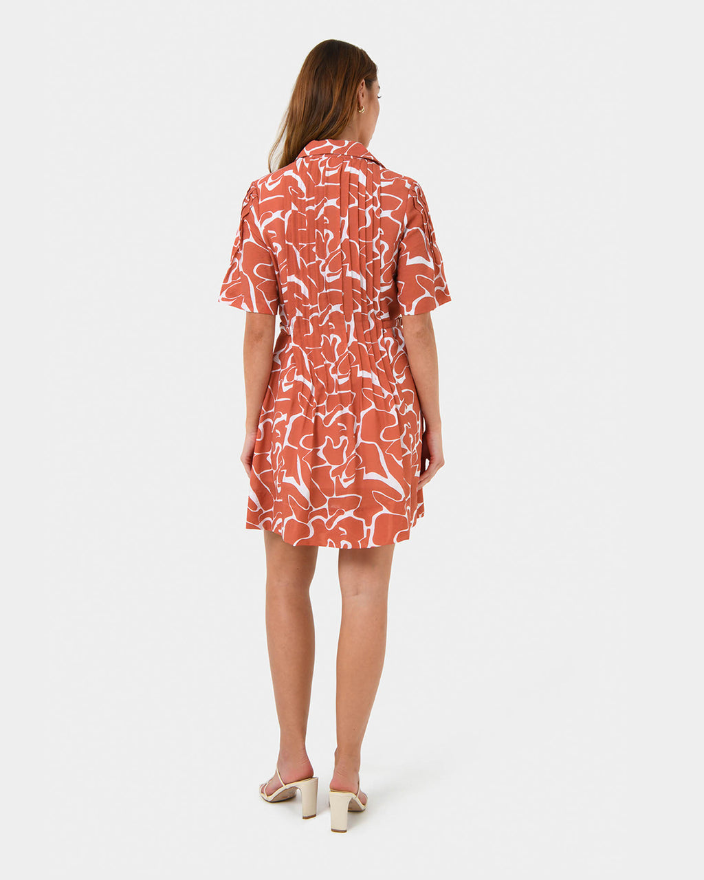Sunshine Pleated Dress in coral print — back view