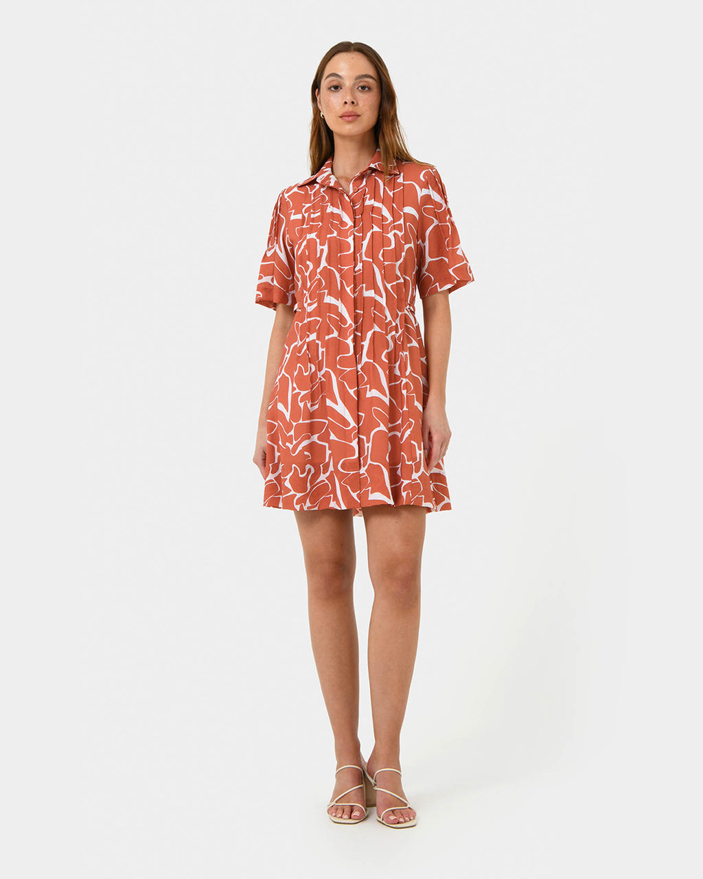 Sunshine Pleated Dress in coral print — full-length view