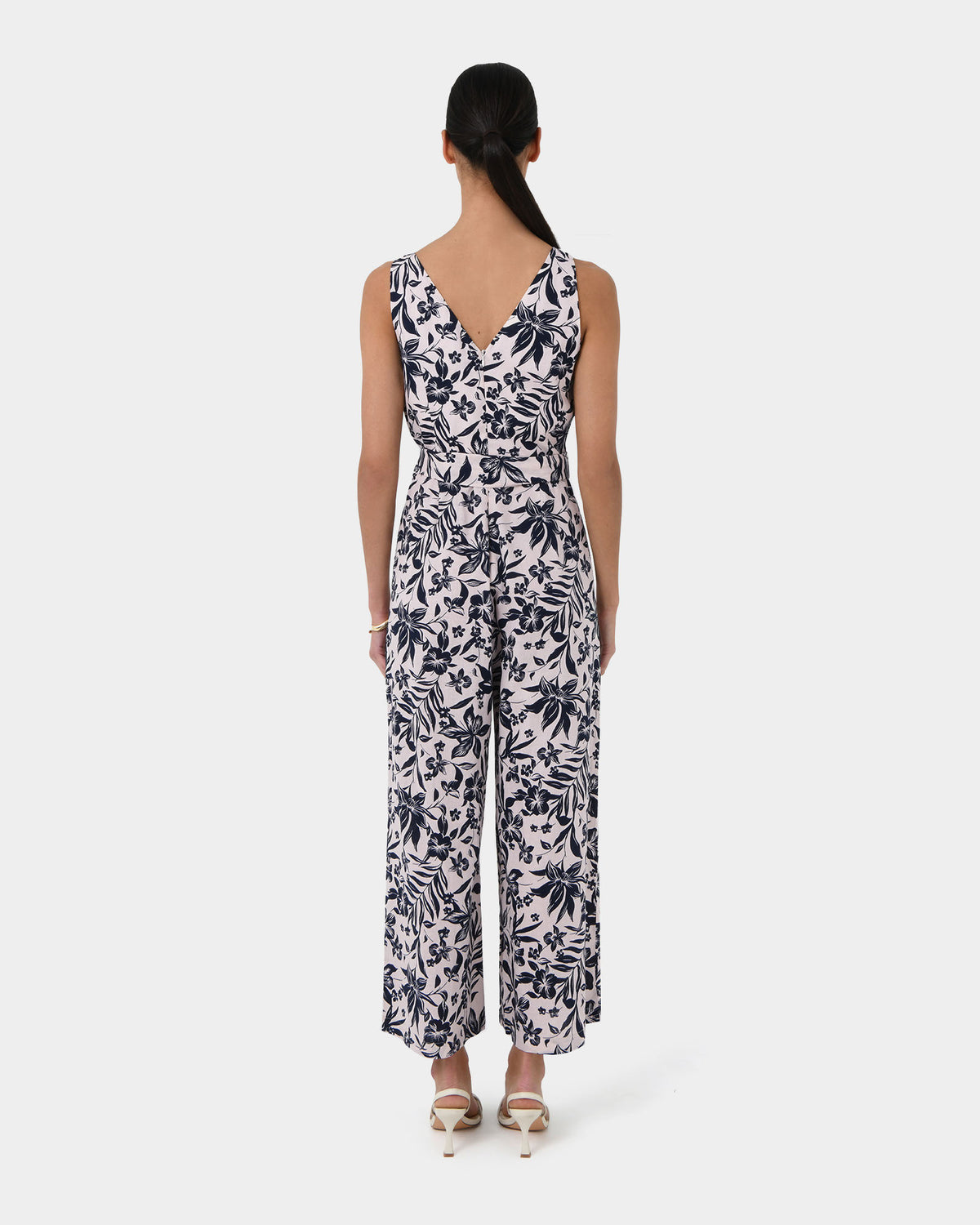 Ren Linen Blend Jumpsuit in navy floral — back view