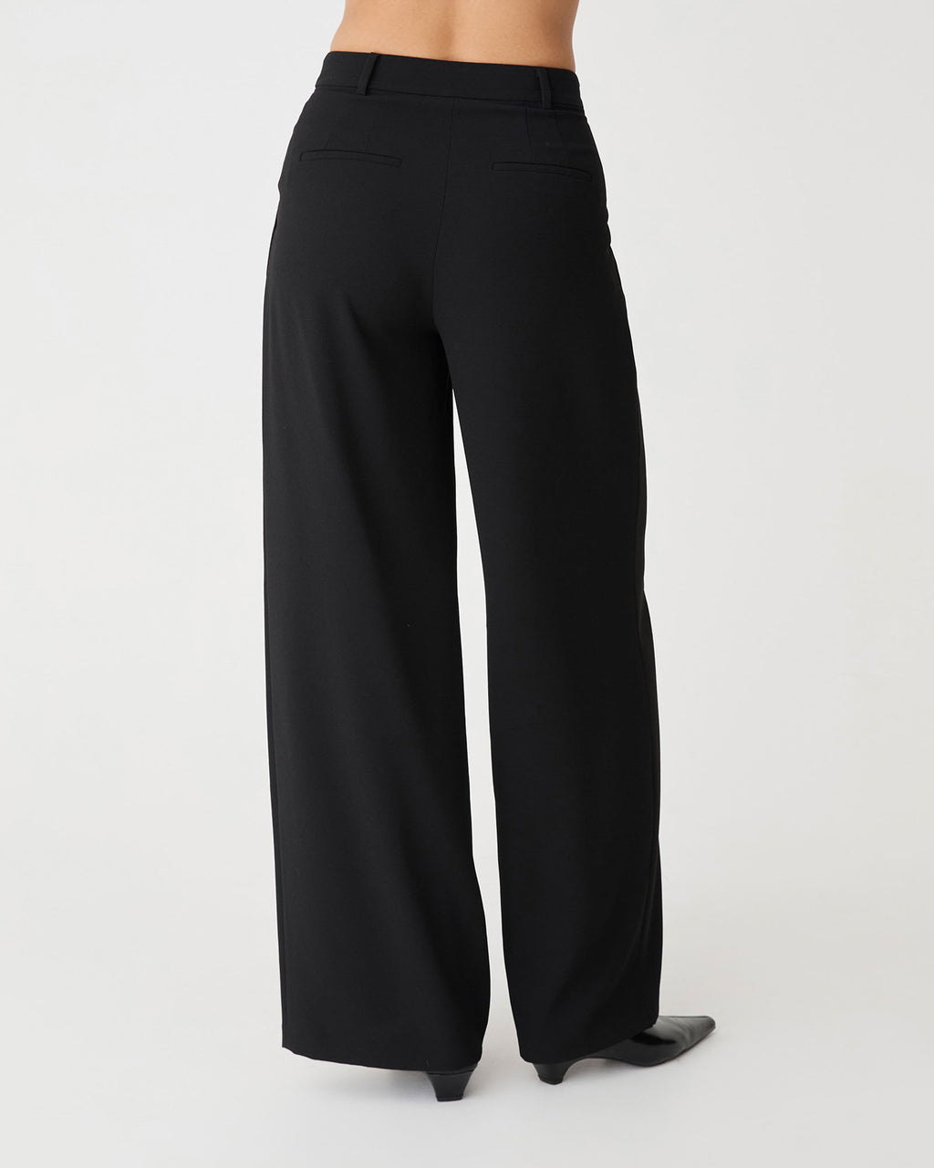 Rumy Wide Leg Tailored Pants in black — back view