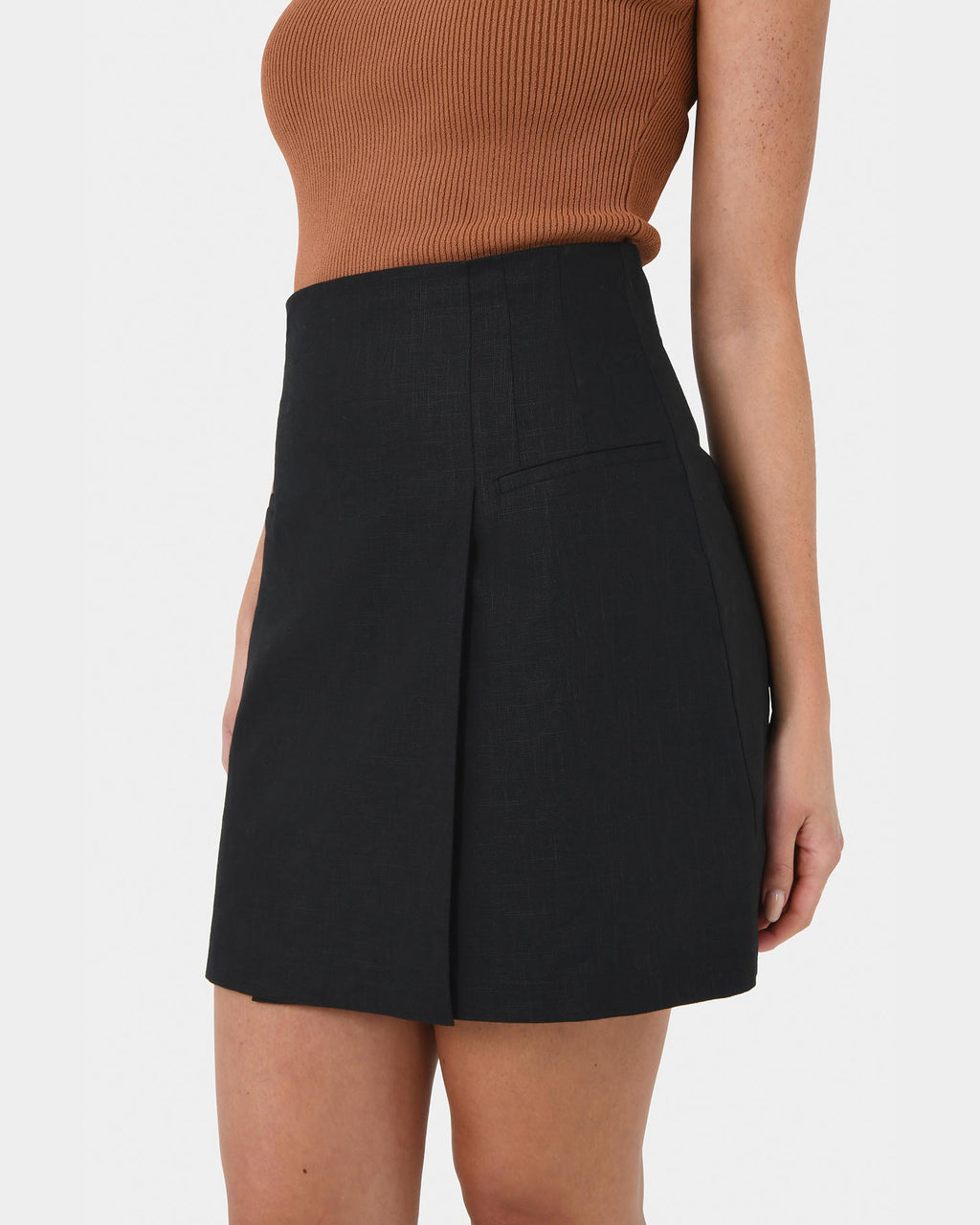 Nia Mini Linen Skirt in black — fabric detail