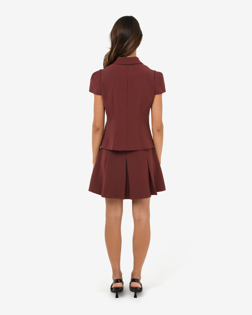 Ace Pleated Skirt in brick — back view