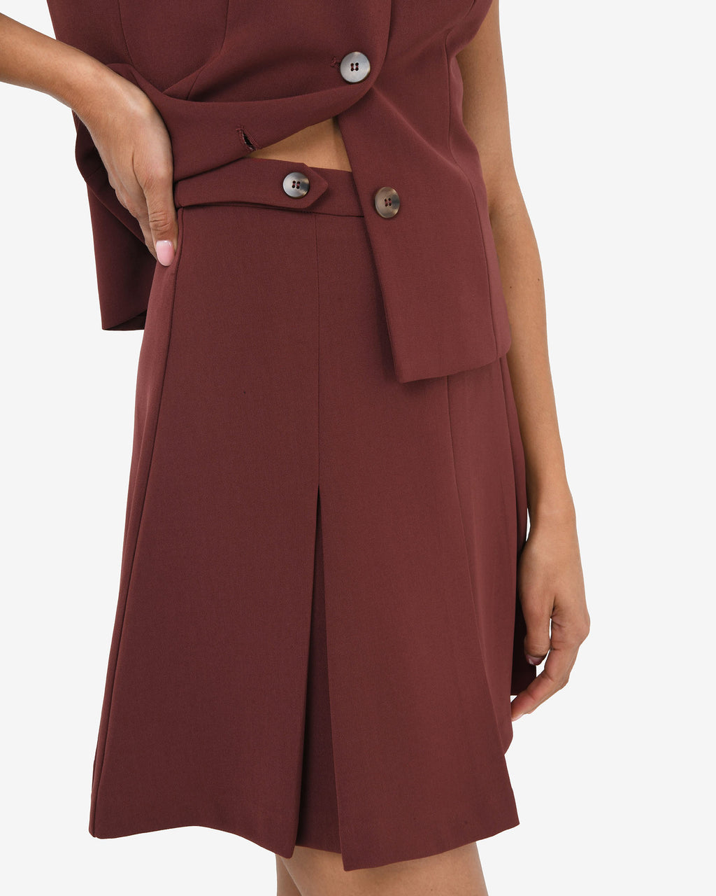 Ace Pleated Skirt in brick — fabric detail