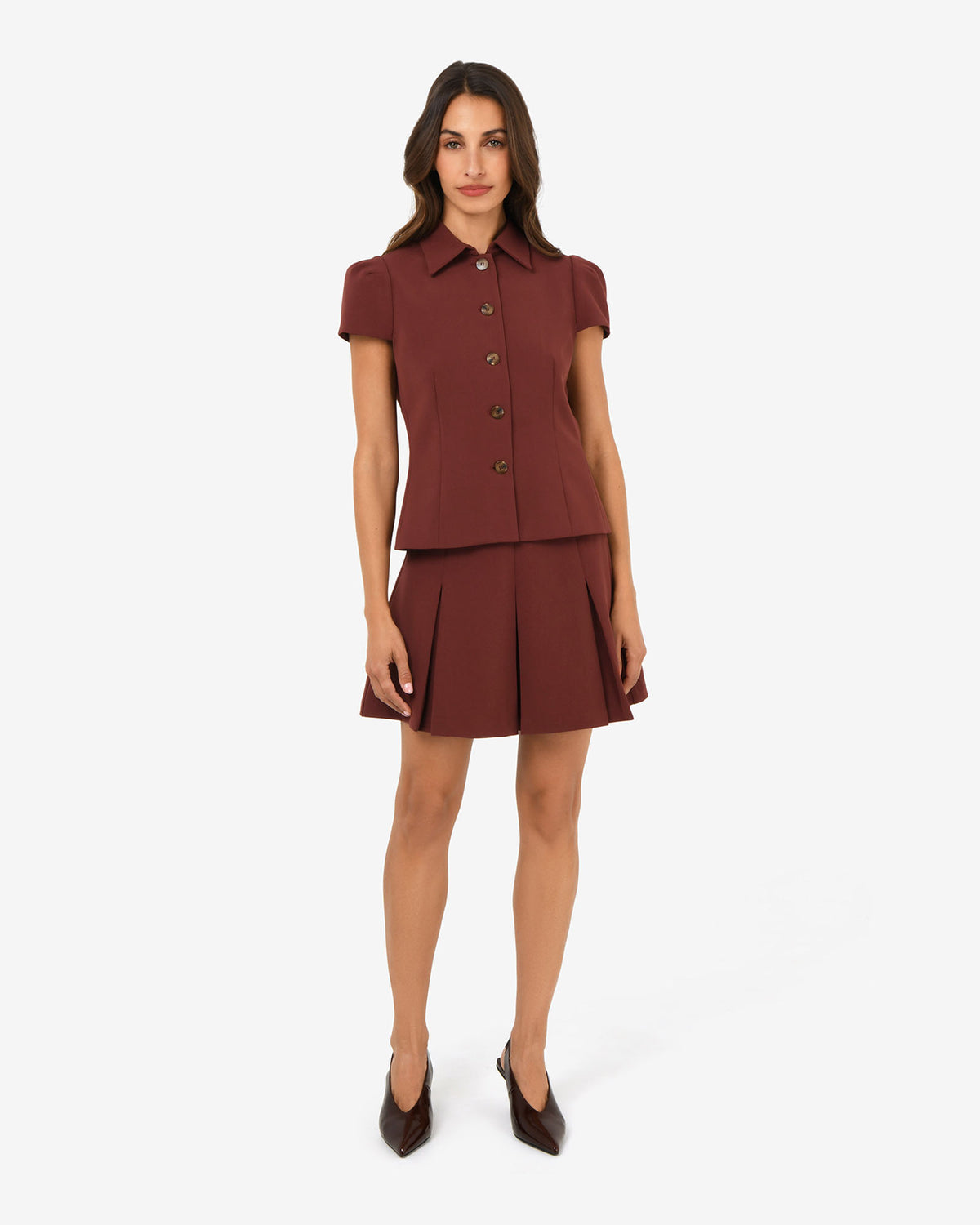 Ace Pleated Skirt in brick — full-length view