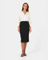 Ace Side Button Skirt in black — full-length view