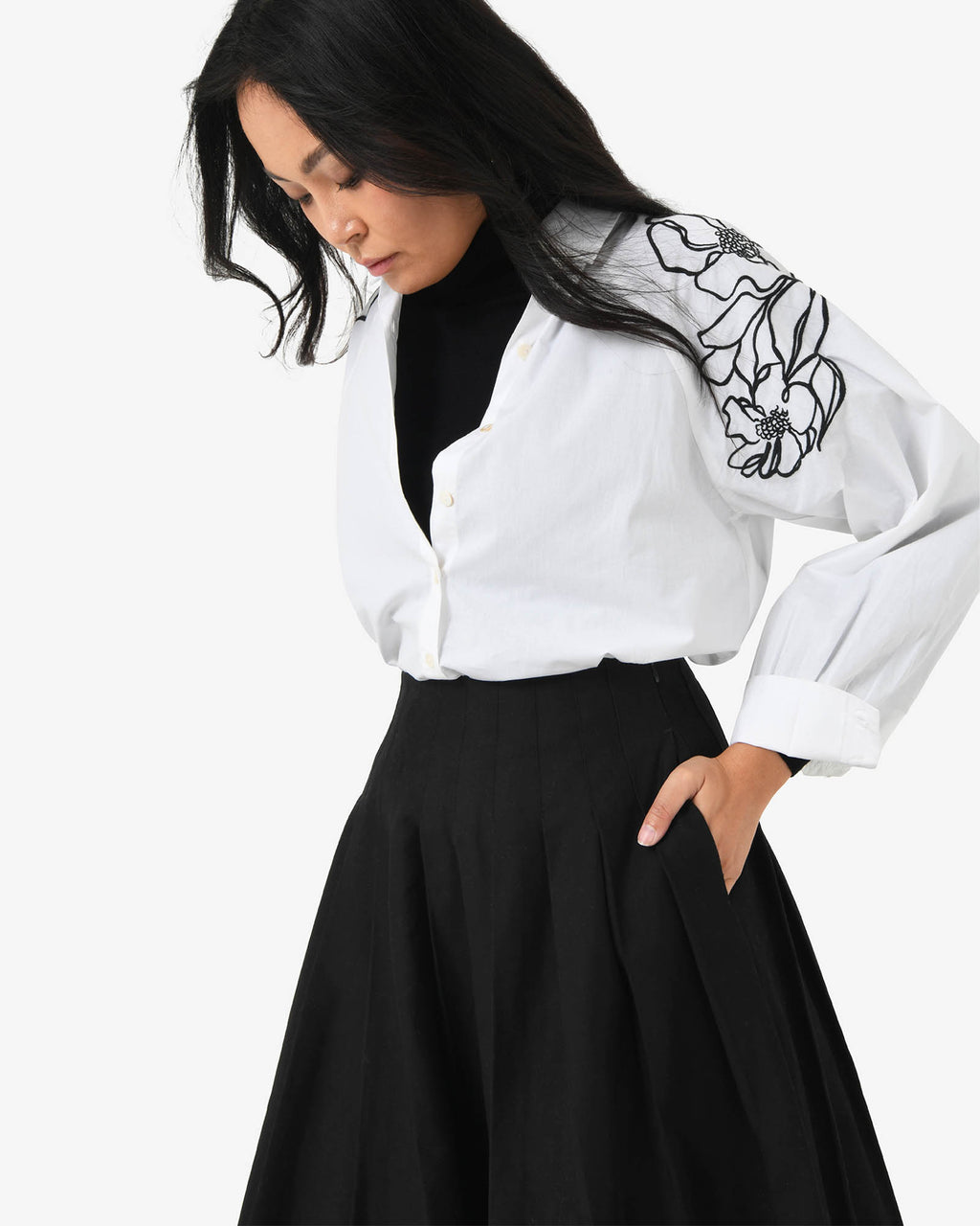 Heira Pleated Midi Skirt in black — close-up view 2