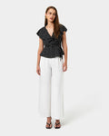 Jules Ruffle Wrap Blouse in polka dot — full-length view