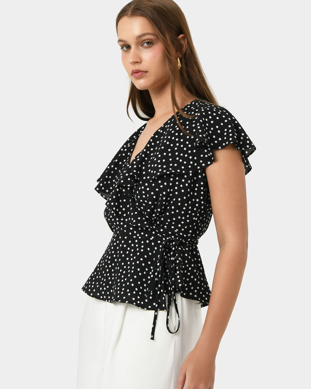 Jules Ruffle Wrap Blouse in polka dot — side view