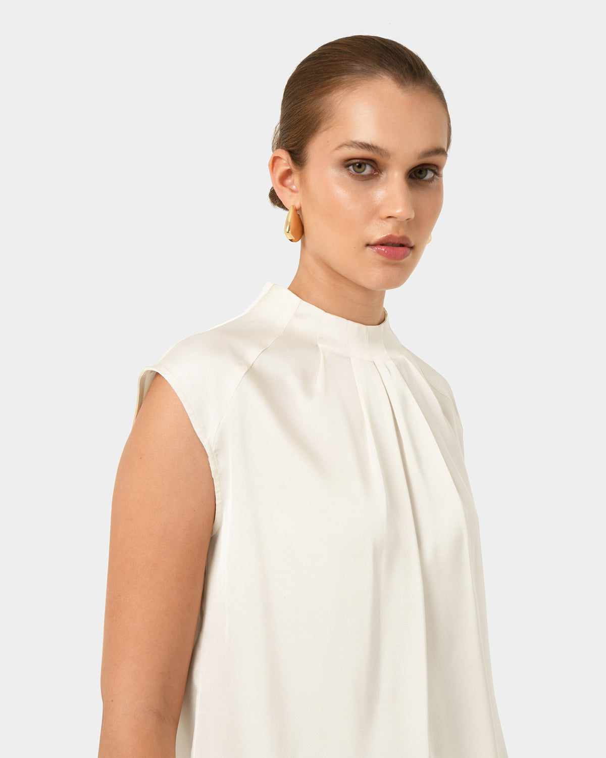 Kiar Pleated Satin Top in ivory — fabric detail