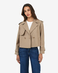 Collins Cropped Trench Coat in beige — close-up view