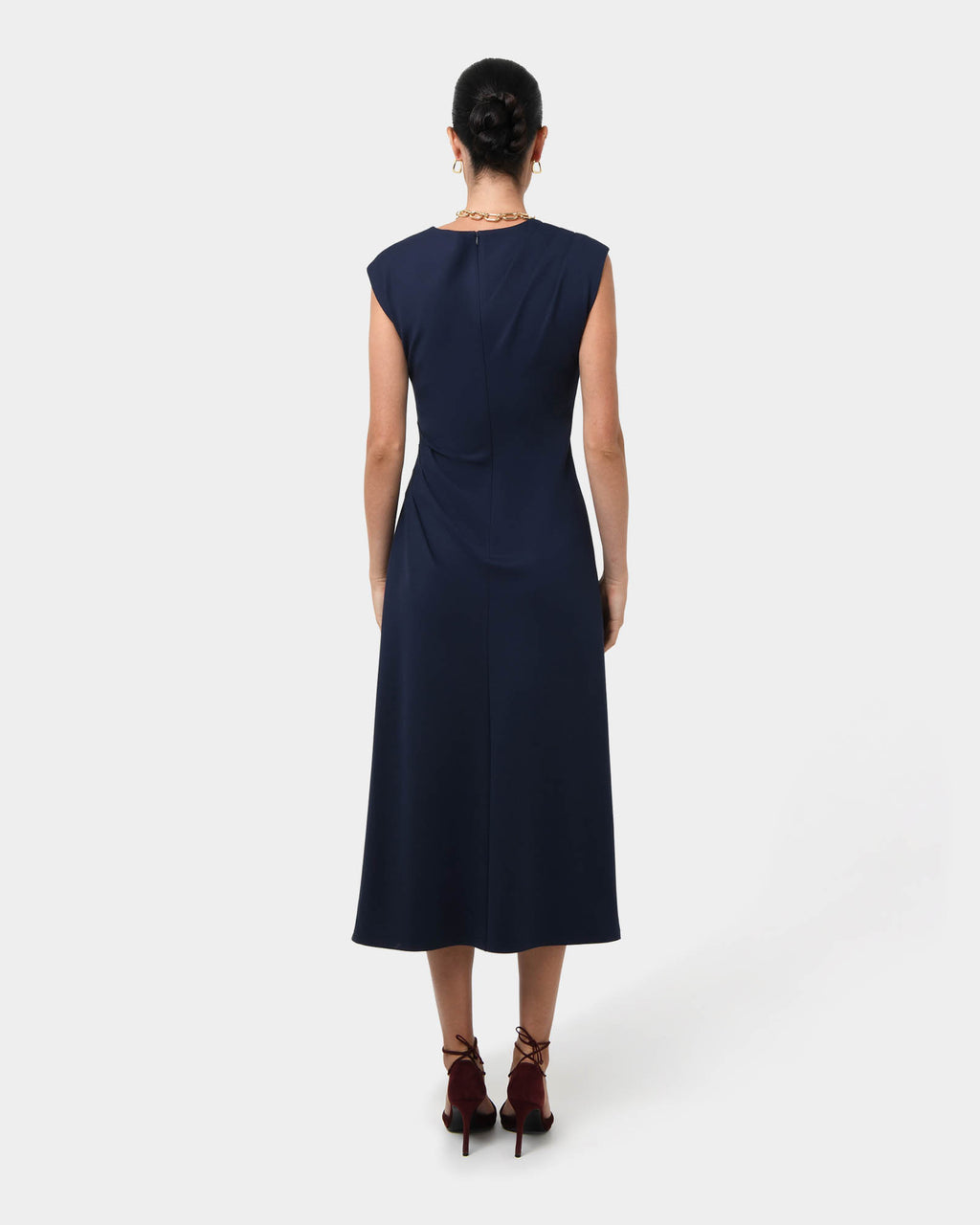 Adele Pleated Midi Dress in navy — back view