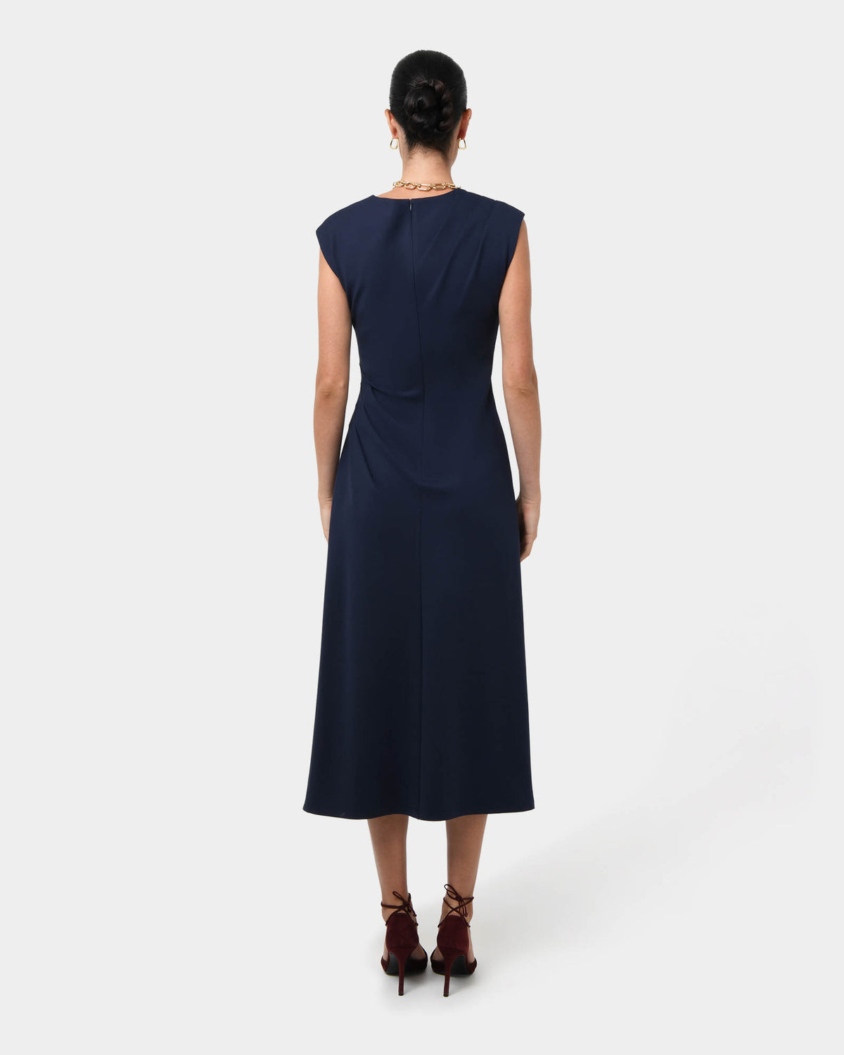 Adele Pleated Midi Dress in navy — back view
