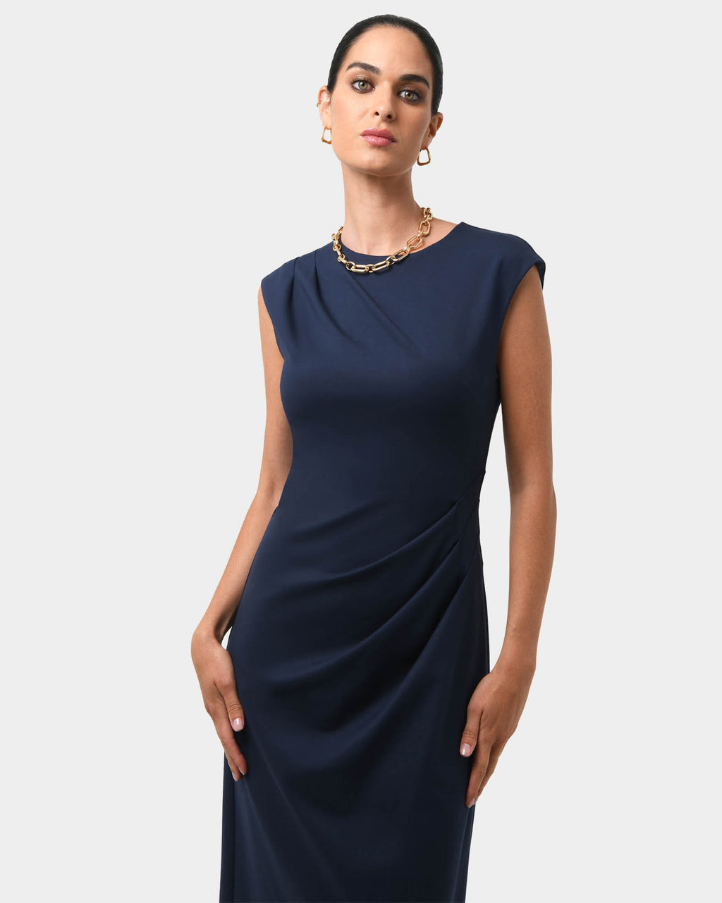 Adele Pleated Midi Dress in navy — close-up view