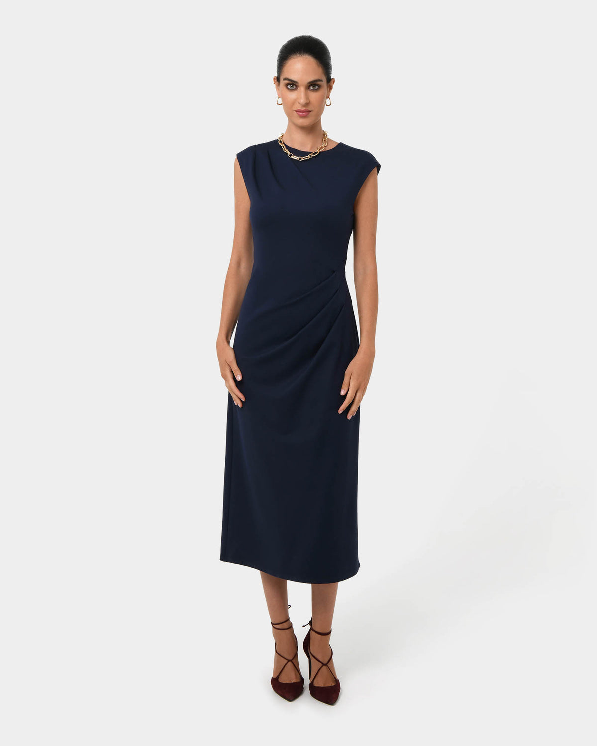 Adele Pleated Midi Dress in navy — full-length view