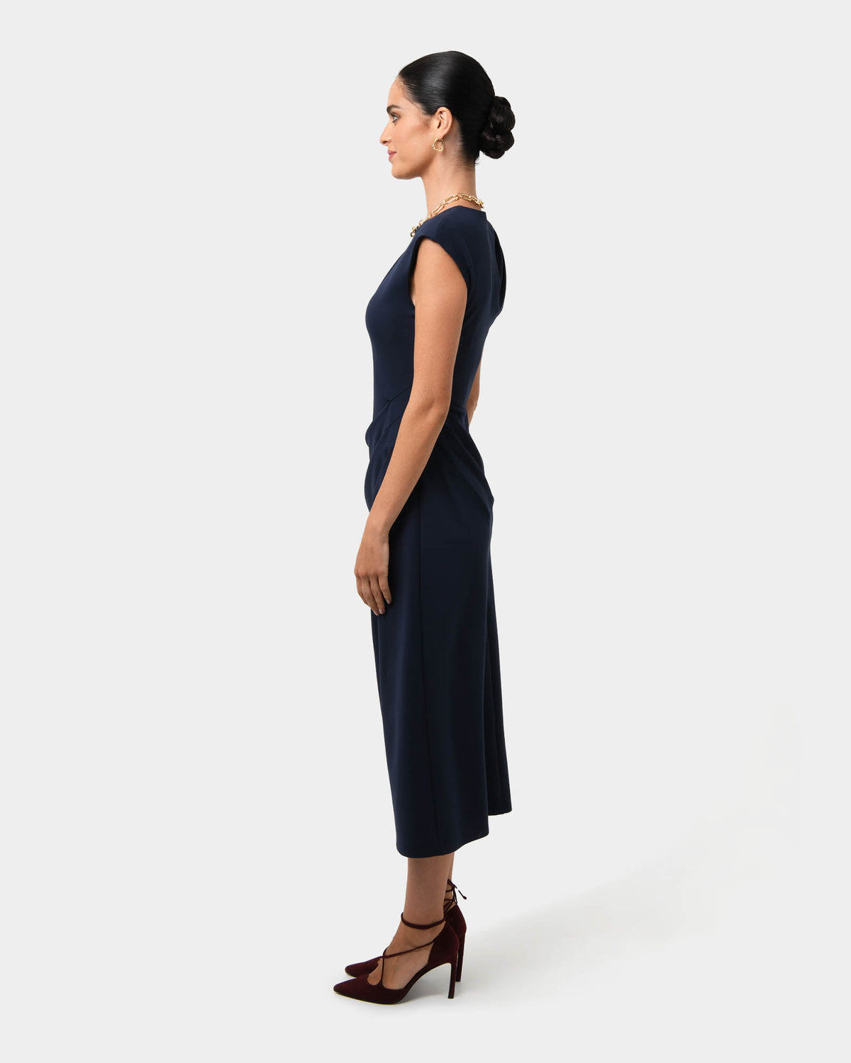Adele Pleated Midi Dress in navy — side view