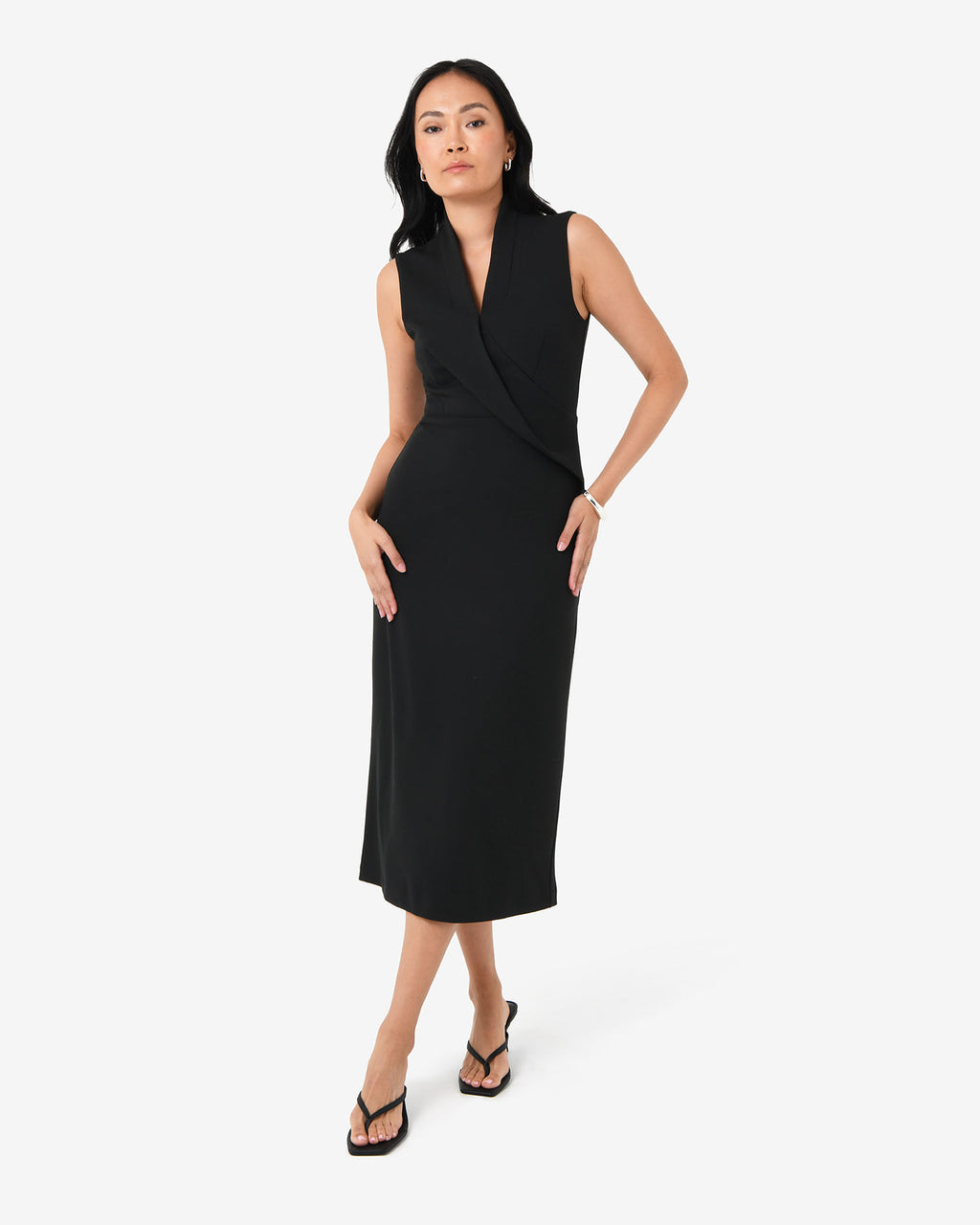 Alaia Twisted Lapel Midi Dress in black — full-length view