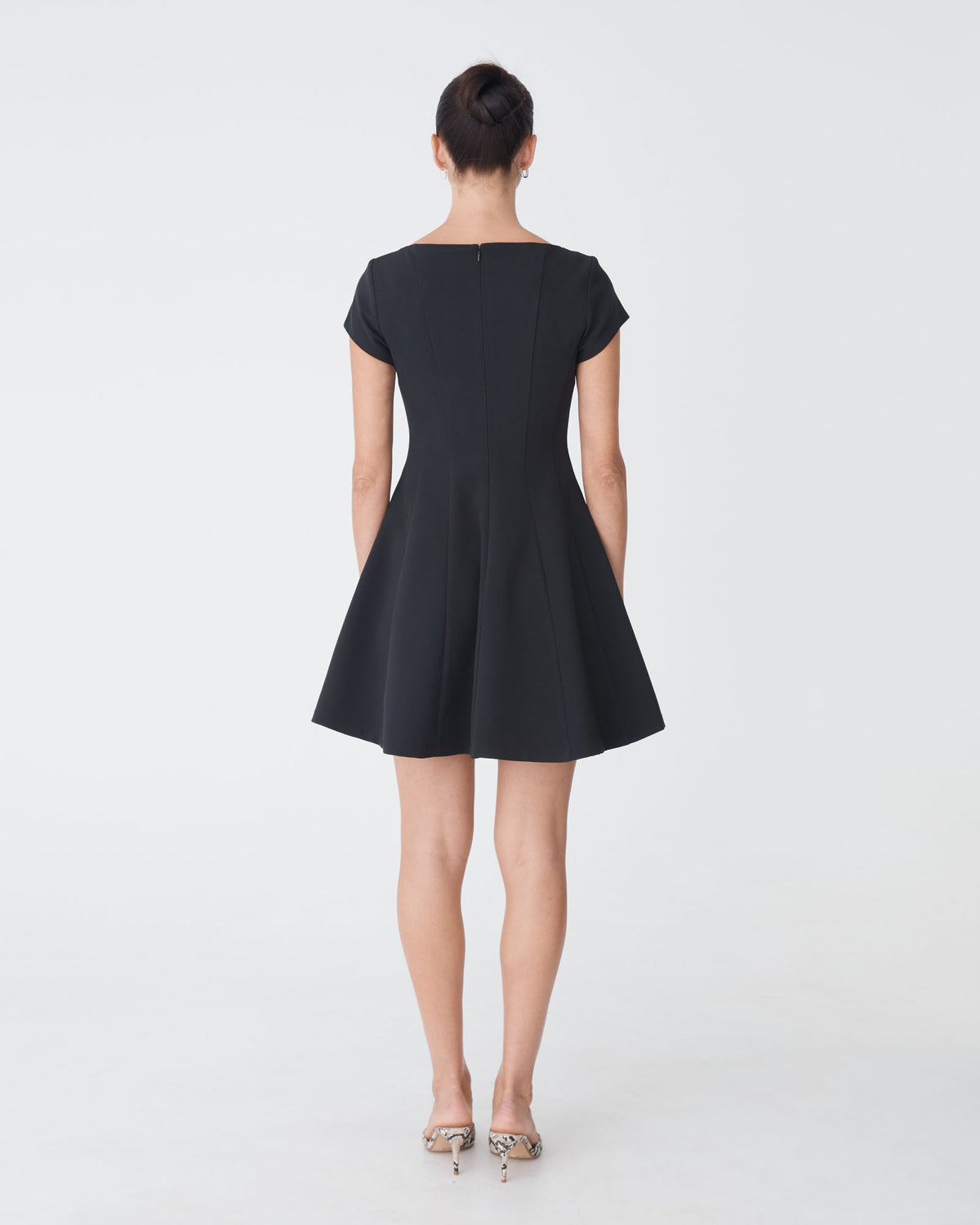 Darcy Short Sleeve Panel Dress in black — back view