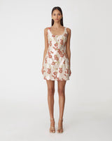 Priya Hourglass Mini Dress in red daisy — full-length view