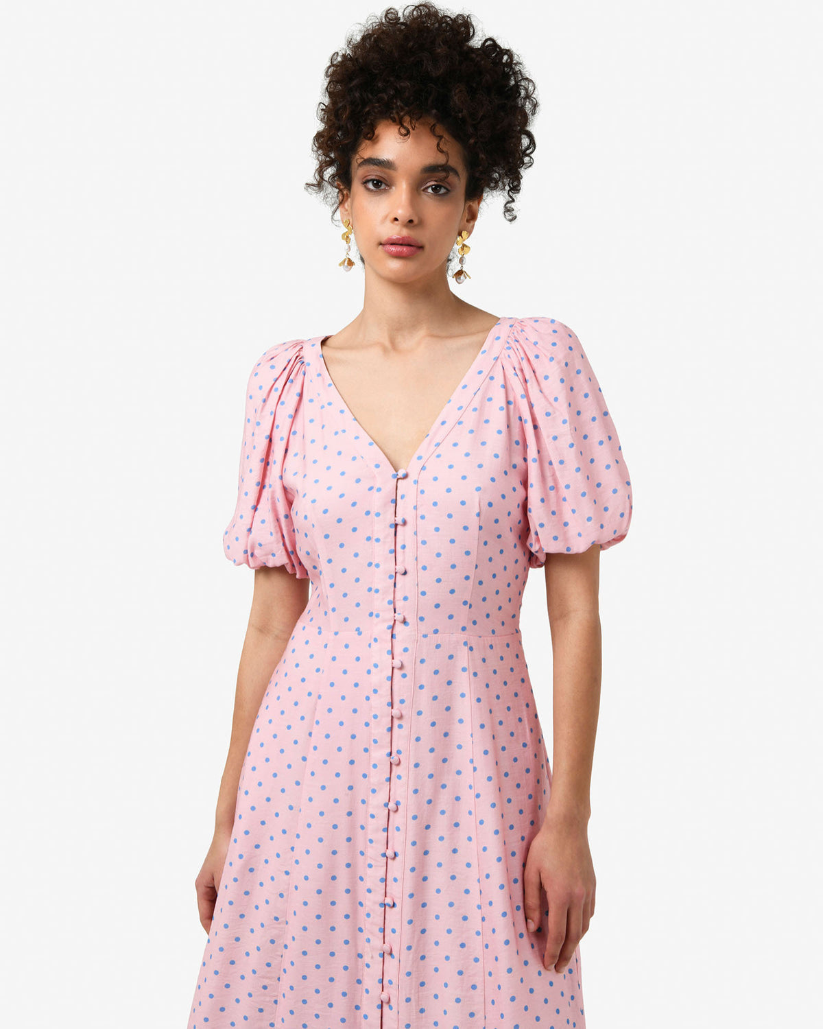 Almeria Polka Dot Dress in pink blue — close-up view