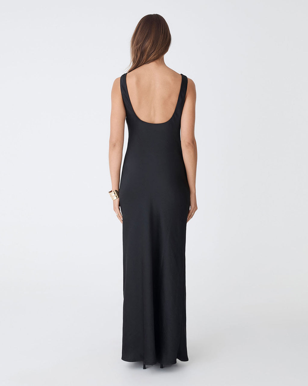Calliope Bias Cut Slip Dress in black — back view